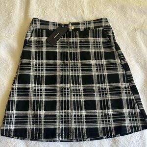 Black plaid skirt.